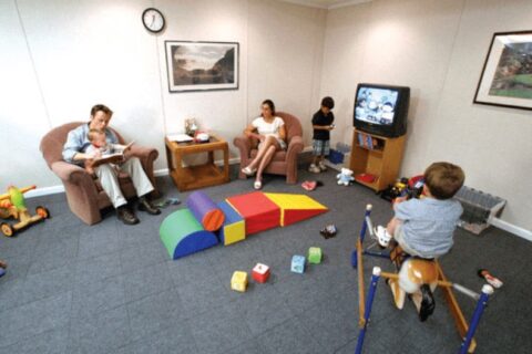 The Children's playing in a room.