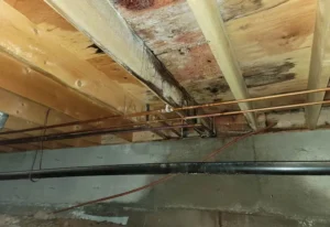 A sill plate between a foundation and rotted subflooring on a Milwaukee, WI area home