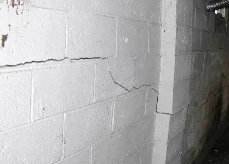 Cracked basement wall due to water damage in Hartford, WI